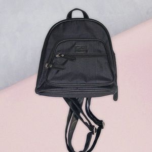 roots backpack purse